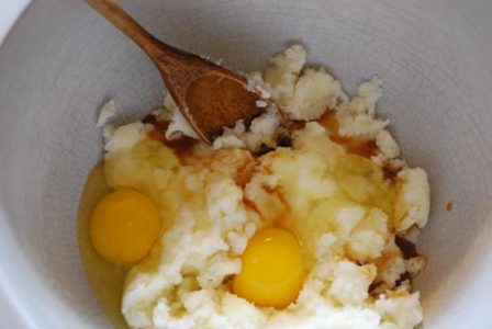 white bowl with a white dough on the bottom and eggs on top with a&hellip;